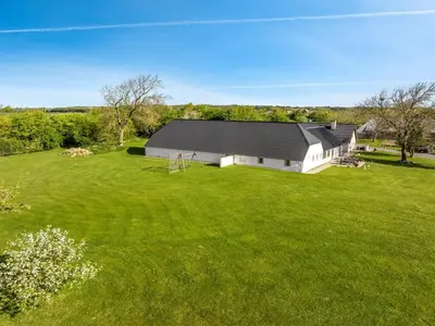 an aerial view of a house with a large yard at Holiday Home Kara - 100m to the fjord by Interhome in Fur