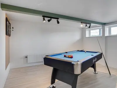 a room with a pool table in a room at Holiday Home Auguste - 1-5km to the fjord by Interhome in Fur