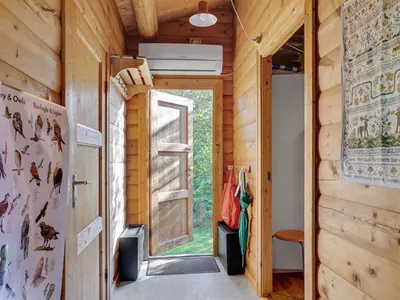 a room with a door in a wooden house at Holiday Home Thrine - 100m to the fjord by Interhome in Fur