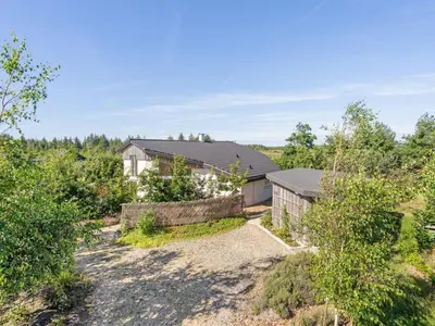 an aerial view of a house with a garden at Holiday Home Ullvi - 3-8km from the sea by Interhome in Brovst