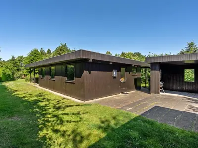 a large house with a large driveway at Holiday Home Ludde - 500m to the fjord by Interhome in Løgstør