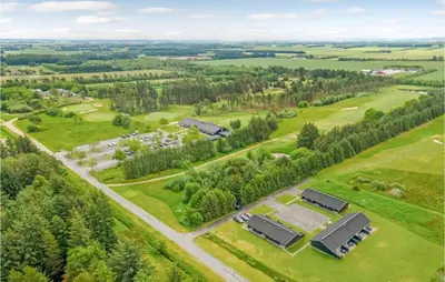 an aerial view of a farm with houses and trees at 2 Bedroom Cozy Apartment In Pandrup in Pandrup
