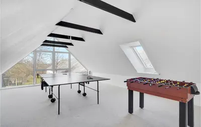 a ping pong table in a white room with a ping pong ball at Gorgeous Home In Højslev With Wifi in Højslev