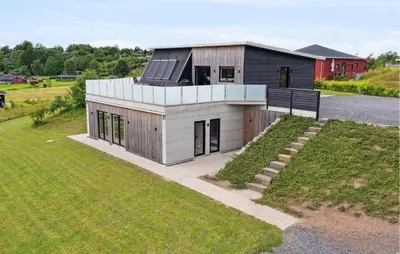 an overhead view of a house with a lawn at Beautiful Home In Spøttrup With Wifi in Spottrup
