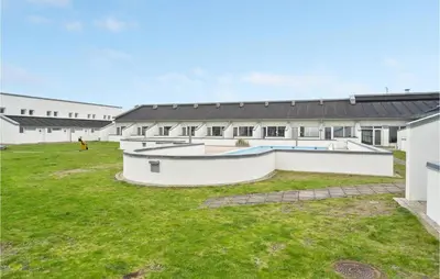 a courtyard with a swimming pool in a building at Gorgeous Apartment In Brovst With Wifi in Brovst
