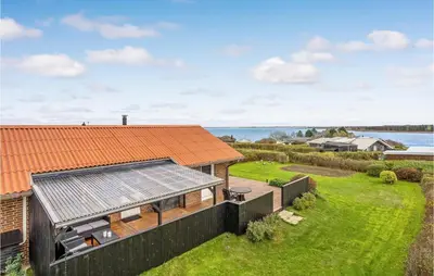 an overhead view of a house with an orange roof at Cozy Home In Hurup Thy With Wifi in Doverodde