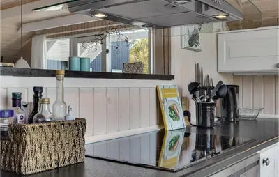 a kitchen with a counter and a counter top with a sink at Lovely Home In Vestervig With Wifi in Vestervig
