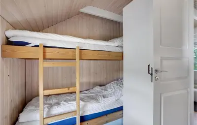 a bunk bed room with two bunk beds at Lovely Home In Vestervig With Wifi in Vestervig