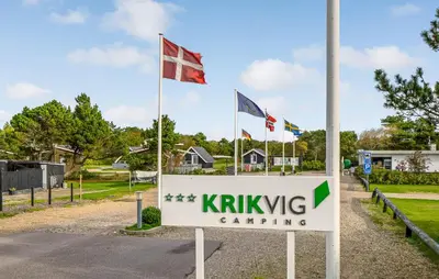 a sign in front of a yard with flags at Gorgeous Home In Vestervig With Kitchen in Vestervig