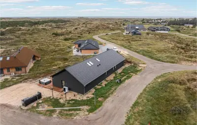 an overhead view of a house with a road next to it at Nice Home In Thisted With Sauna in Thisted