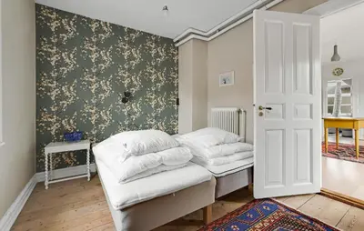 a living room with two white pillows on a couch at Stunning Home In Vestervig With Wifi in Vestervig