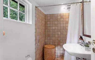a bathroom with a sink and a shower at Awesome Home In Spøttrup With Wifi in Spottrup